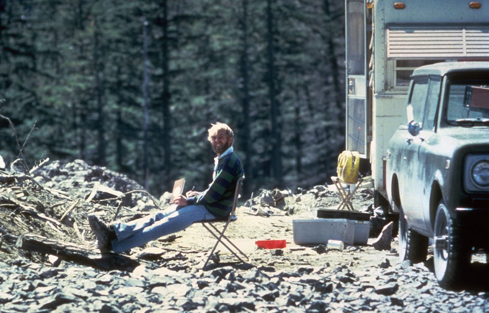 In this May 17, 1980 photo, 30-year old vulcanologist David Johnston is shown in the evening at his camp near what is now known as Johnston Ridge near Mount St. Helens.